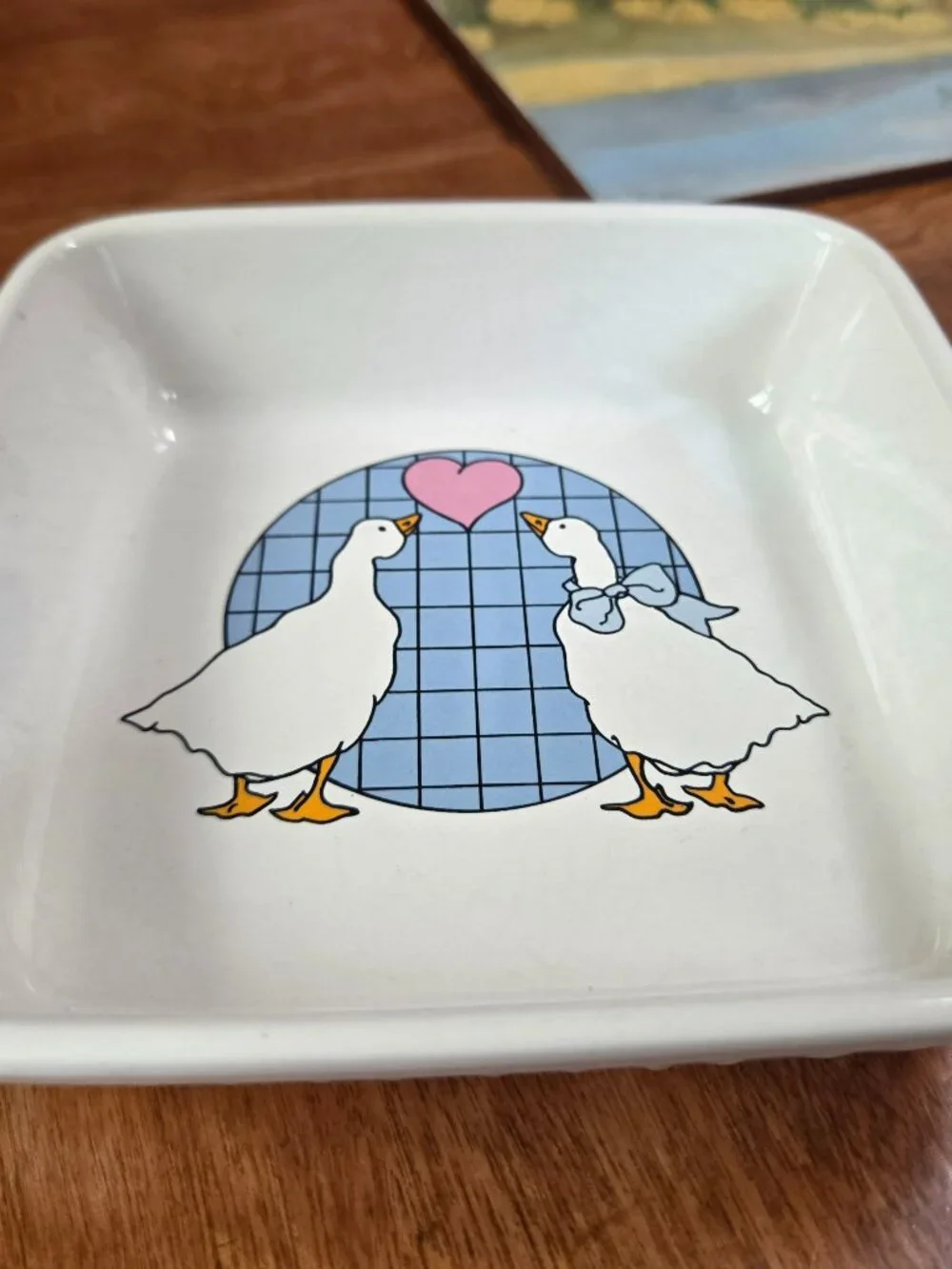 vintage stoneware square dish ducks with bows checkered background